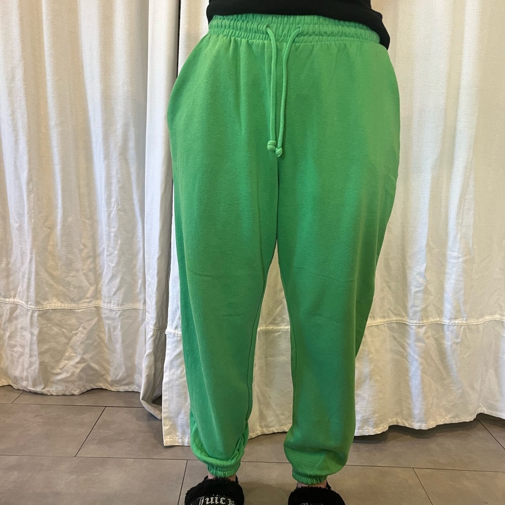 green sweatpants